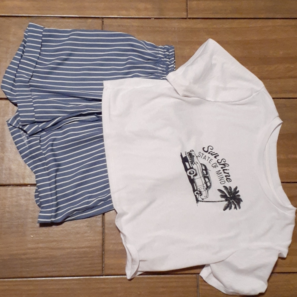 white cropped t-shirt and blue striped shorts